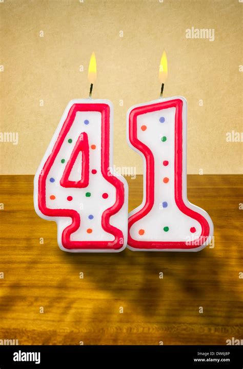 Burning birthday candles number 41 Stock Photo - Alamy