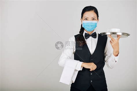 亚洲餐馆女服务员戴医疗面具提供高清图片下载-正版图片506653071-摄图网