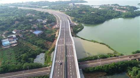 岳阳北环线洛家山路正式通车|岳阳市公路桥梁基建总公司|