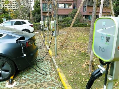 新能源环保电动车充电桩户外摄影图配图高清摄影大图-千库网