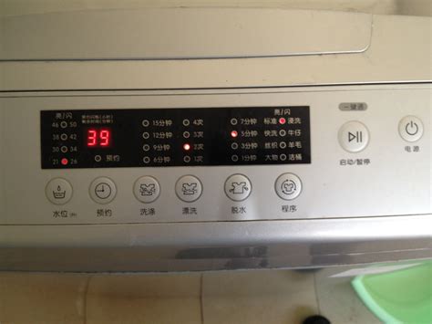 全自动洗衣机按哪个按钮是自动排水?_百度知道