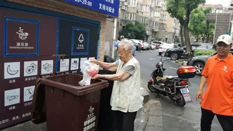上海垃圾分类雨中正式开始！10路记者见证上海人考几分-国际环保在线