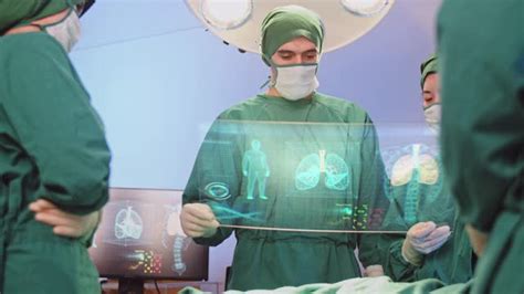 外科医生团队采用全息图现代虚拟屏幕在手术室进行手术，AR增强现实技术在医院医疗保健。—高清视频下载、购买_视觉中国视频素材中心