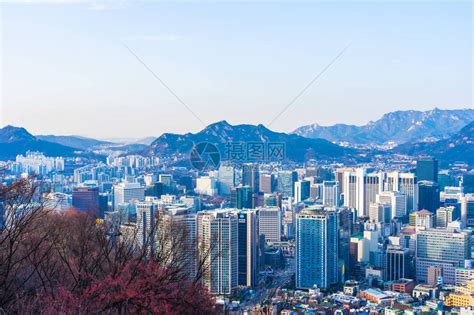 韩国首尔市中心城市景观的空中日落夜景与首尔塔高清图片下载-正版图片300885746-摄图网