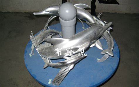 不锈钢浪花海豚雕塑-宏通雕塑