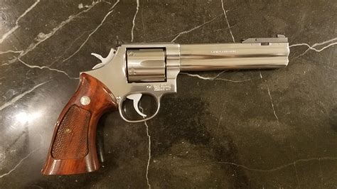 Smith & Wesson 686 Plus Deluxe 6" .... for sale at Gunsamerica.com ...