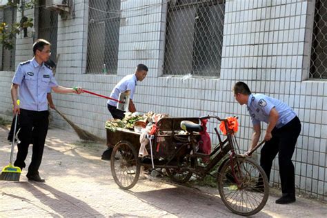 西华县公安局领导带头上街打扫卫生 强力助推环保清洁工作_河南频道_凤凰网