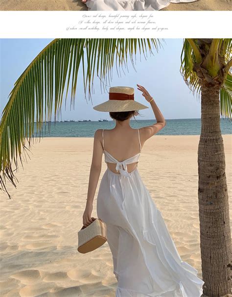 海边度假连衣裙遮肉显瘦黄色露背三亚旅行穿搭法式设计感小众长裙-淘宝网