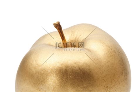 金色背景上的金苹果高清摄影大图-千库网