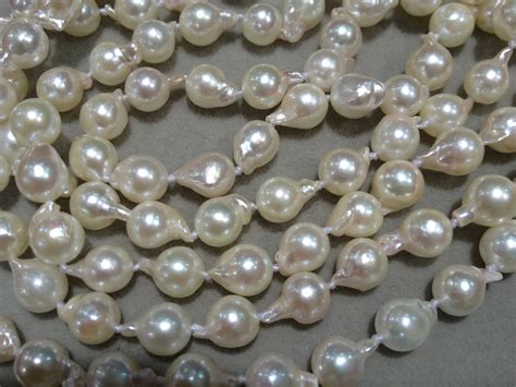 珍珠项链什么形状好,想买珍珠项链但分不清珍珠的品种