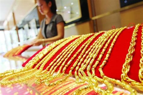 香港买金子什么牌子好,国际黄金上涨遇阻