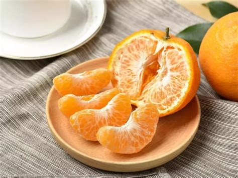 柚子和橘子吃哪个好,冠心病人吃柚子和橘子好不好